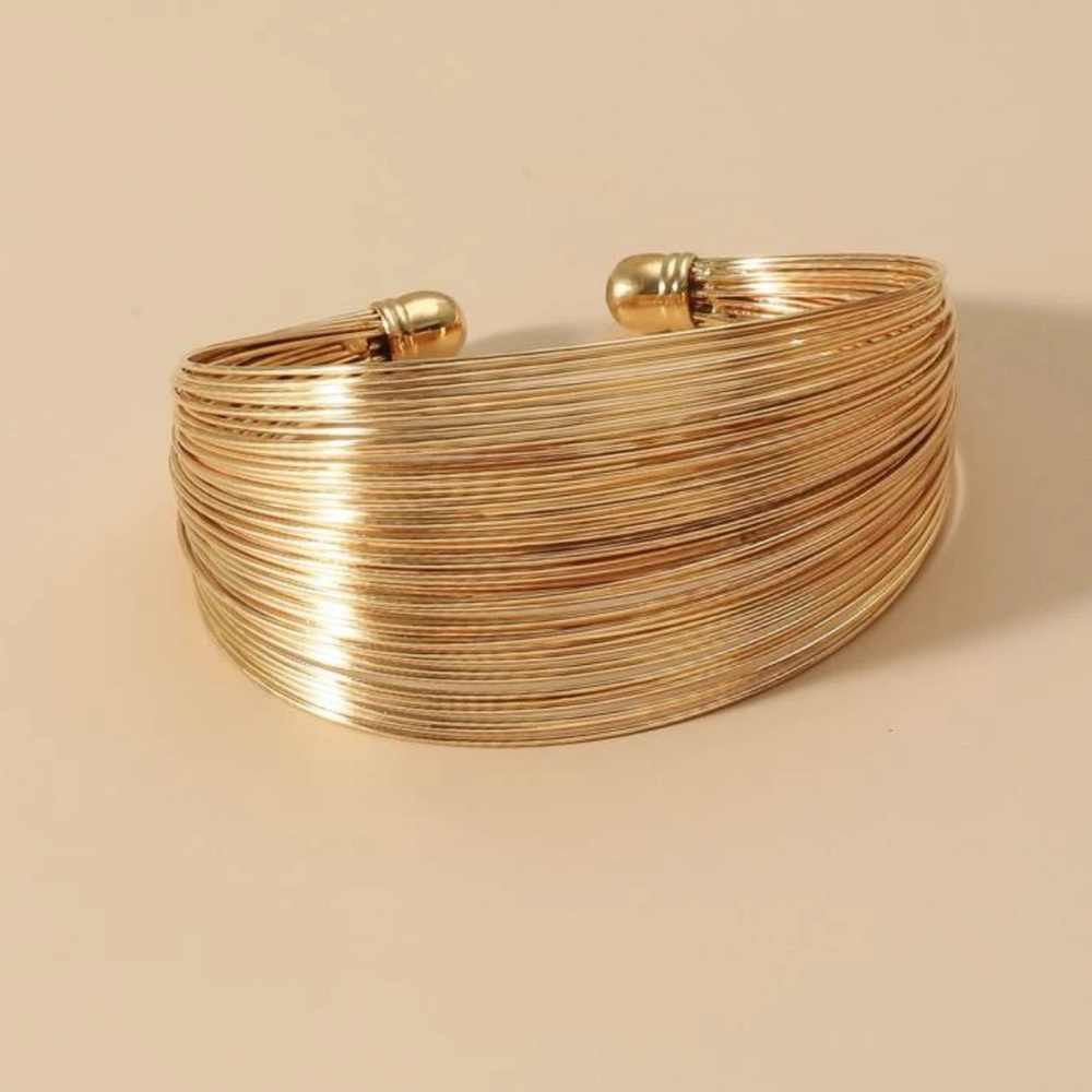 New! Gold tone wide cuff Bracelet